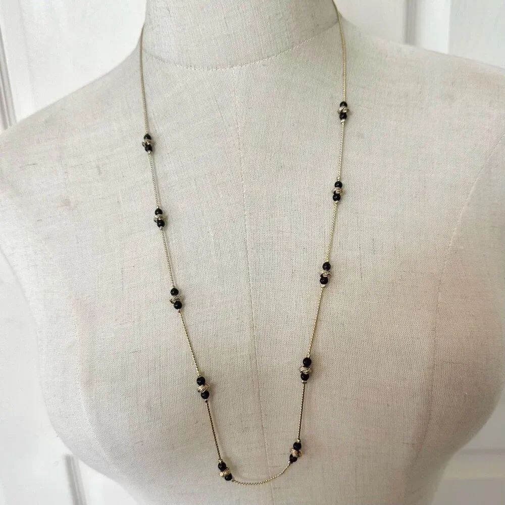 Black and gold tone long beaded vintage necklace